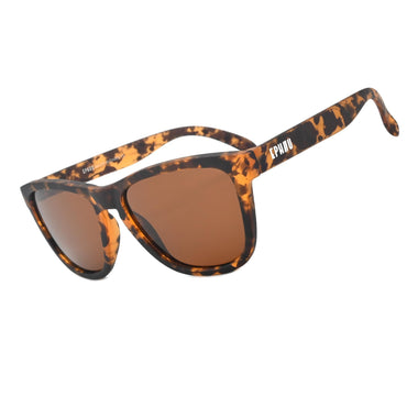 Sunglasses with tortoiseshell frame and brown lenses on a white background